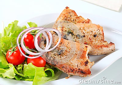 Herb rubbed pork belly slices Stock Photo