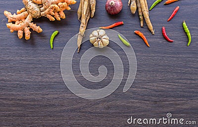 herb and spicy ingredients for making Thai food on wood background.have space for put some text Stock Photo