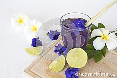 Herbal healthy drinks lemon with butterfly pea blue cocktail water Stock Photo