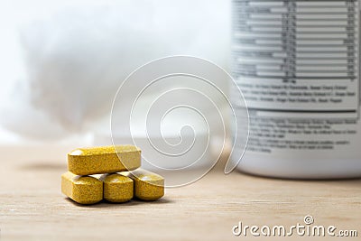 Turmeric and ginger root dietary supplement tablets Stock Photo