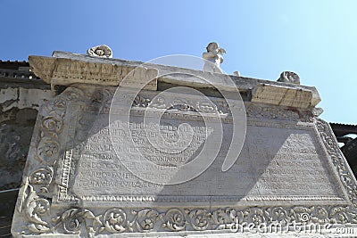 Herculaneum Italy ancient inscription and statue of Nonius Balbus Stock Photo