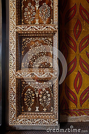 wooden carved door with ivory inlay works inside of tombe Tippu Sultan, his father Hyder Ali and his mother Fakhr-Un-Nisa. Mysore Stock Photo