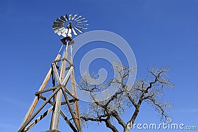 Heritage Farm House wind Mill Stock Photo