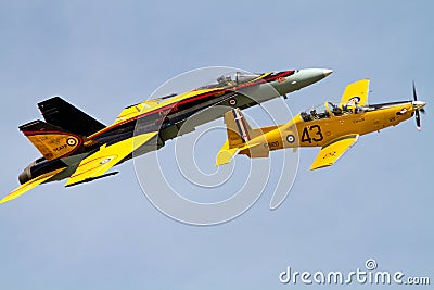 Heritage Flight CF-18 Hornet and CT-156 Harvard Editorial Stock Photo