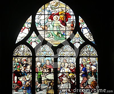 Herod Antipas with the head of John the Baptist in Salome, stained glass, Saint Severin church, Paris Editorial Stock Photo