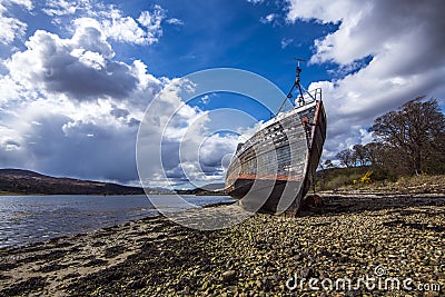 The wreck of a fishing trawler at Corpach near Fort William in the Highlands of Scotland Editorial Stock Photo