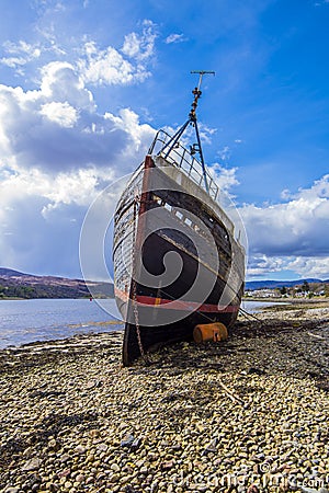 The wreck of a fishing trawler at Corpach near Fort William in the Highlands of Scotland Editorial Stock Photo