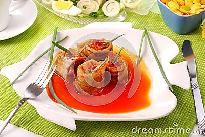 Herring rolls in salsa sauce for easter Stock Photo