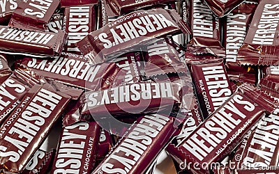 Hershey`s brand milk chocolate candy bars on a white background. Editorial Stock Photo