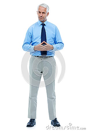 Hes a total professional. Full length studio shot of a mature businessman isolated on white. Stock Photo