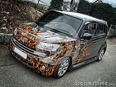 Heubach, Germany - February, 05, 2016: Modified Daihatsu Materia classic car. Editorial Stock Photo