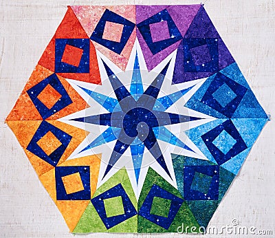Hexagon patchwork block like kaleidoscope, detail of quilt Stock Photo