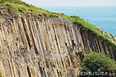 Hexagonal columns of volcanic origin at the Hong Kong Global Geopark in Hong Kong, China. Stock Photo