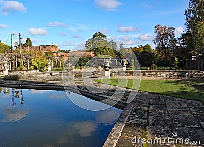 A hexagonal pond and formal gardens at Arley Arboretum in the Midlands in England Stock Photo