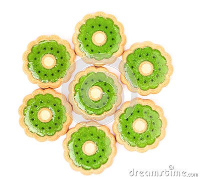 Hexahedron of biscuit with kiwi jam. Stock Photo