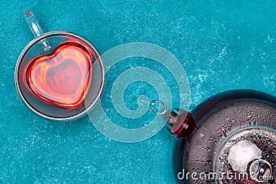 Hibiscus tea in glass teapot and cup Stock Photo