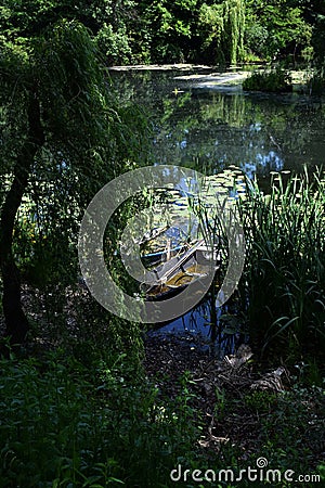 HIDDEN BOATS ON GREAT BACKA CANAL SERBIA Stock Photo