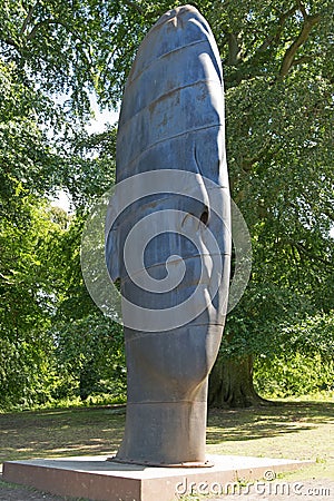 Hidden face off in the forestry of Yorkshire Sculpture Park, West Bretton, Wakefield. Editorial Stock Photo