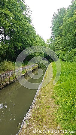 Hidden River along a main road , Plymouth Devon Stock Photo