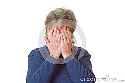 Hiding her face in shame Stock Photo