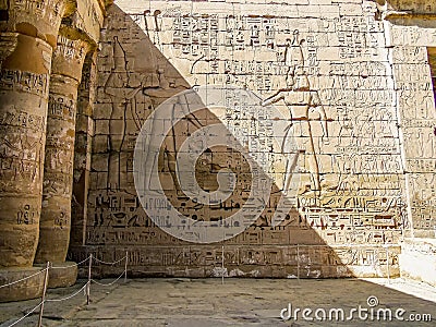 A hieroglyphic storyboard at the temple ruins at Deir el-Shelwit near to Luxor, Egypt Stock Photo