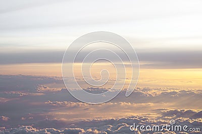 High above the clouds with beautiful sunset light. Stock Photo