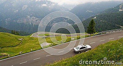 High alpine road with car Stock Photo