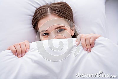 High angle above view closeup photo charming lady lying linen bed covered blanket enjoy weekend saturday morning hiding Stock Photo
