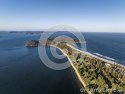 High angle aerial evening drone view of Palm Beach and Barrenjoey Head and Lighthouse. Stock Photo