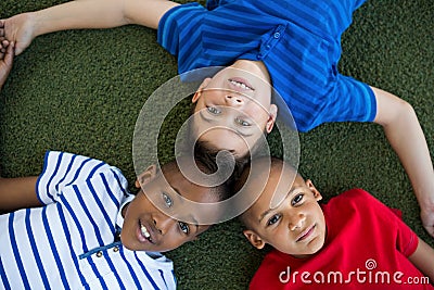 High angle portrait of children forming huddle Stock Photo