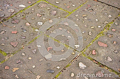 High angle shot of a beautiful cobblestone ground with small red stones Stock Photo