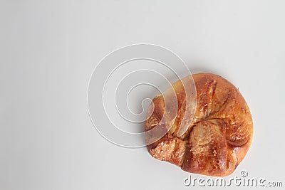 High angle shot of a loaf of homemade bread isolated on a white surface Stock Photo