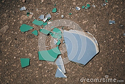 High angle shot of the pieces of a shattered mirror Stock Photo