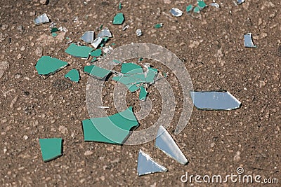 High angle shot of the pieces of a shattered mirror Stock Photo