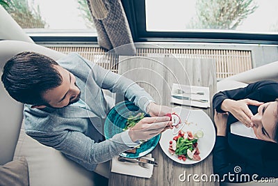 High angle top view of romantic brunet bearded guy, proposing to Stock Photo