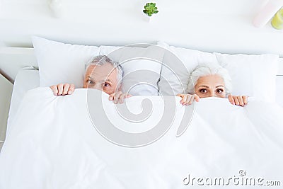 High angle top view surprised funny couple gray hair people in p Stock Photo