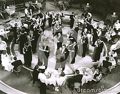 High angle view of couples dancing in nightclub Stock Photo