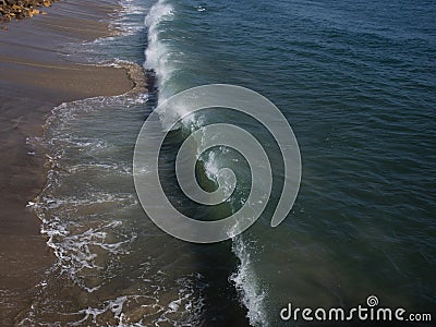 High Angle View of a crashing wave at Malibu Beach Stock Photo