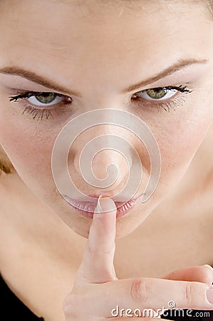 High angle view of female asking to keep silent Stock Photo