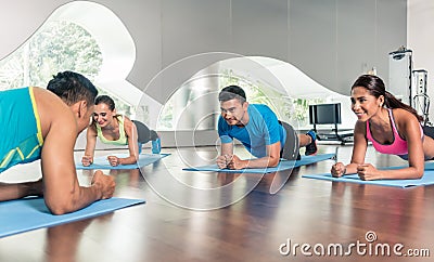 High-angle view of a fitness instructor during group calisthenics class Stock Photo