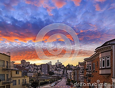 High angle view of homes on the famous crooked Lombard Street, San Francisco California with fiery skies at sunset Stock Photo