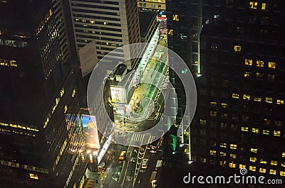 High Angle View of New York City Avenues. Tiny vehicles Moving, Traffic, Street Lights as Seen from the 48th Floor of a Skyscraper Editorial Stock Photo