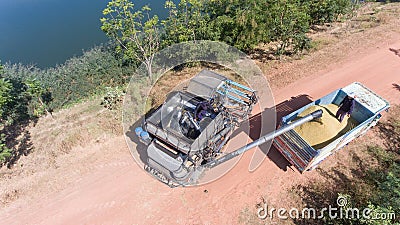 High angle view of a rice farmer loading a truck. Editorial Stock Photo