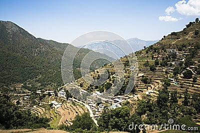 High angle view of small village with terraced field, Uttarkashi District, Uttarakhand, India Stock Photo