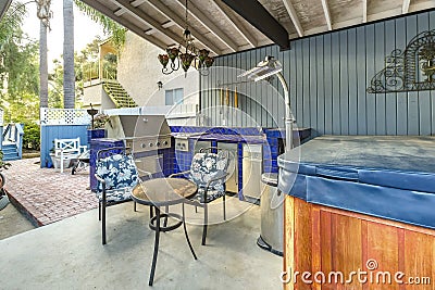 High angle view of a stylish outdoor kitchen on a brick patio wi Stock Photo