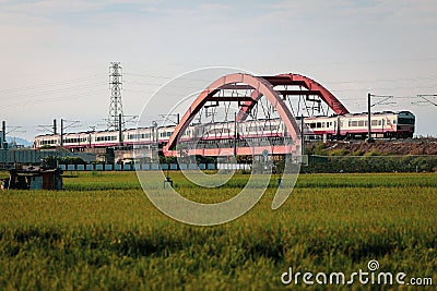 High angle view of the Tze Chiang Express Train travelling on the Red Zebra bridge in Taiwan Editorial Stock Photo