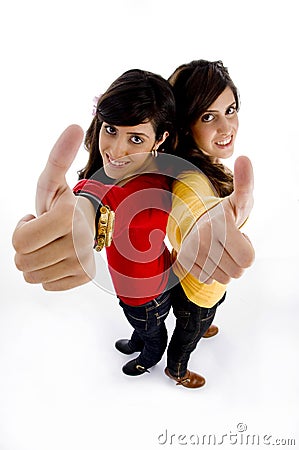 High angle view of young models showing thumb up Stock Photo