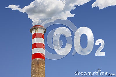 High concrete chimney emits CO2 into the atmosphere - concept image Stock Photo