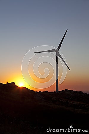 High constrast sillouette of a wind turbine Stock Photo