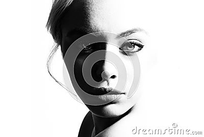 High contrast black and white portrait of a beautiful girl. Stock Photo